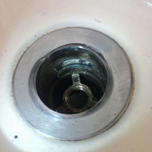 Slotted waste and leaking basin