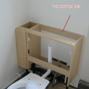 Concealed cistern in vanity unit