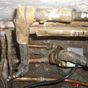 Central heating airing cupboard pipework