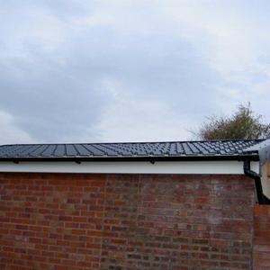 Steel tile effect roofing