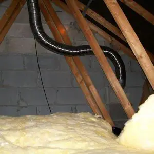 Single flue in attic of house