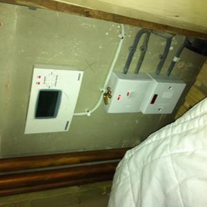 Programme and switches in airing cupboard