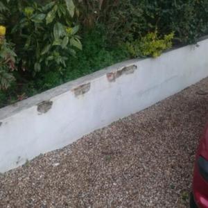 garden wall with holes in cement